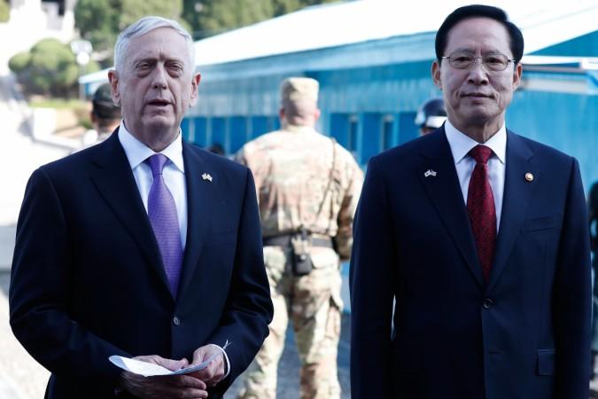 Secretary of Defense James Mattis (L) talks with South Korean Defense Minister Song Young-moo James Mattis