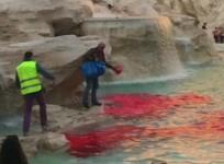 Romes Trevi Fountain runs red after man pours dye in water