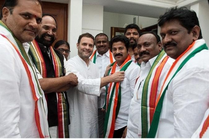 Former TDP working president Revanth Reddy joins Congress party in the presence of AICC vice-president Rahul Gandhi in New Delhi on Tuesday. Revanth Reddy