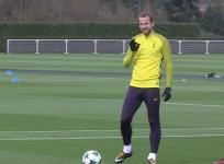 Harry Kane gives OK sign in training before Tottenham face Real Madrid