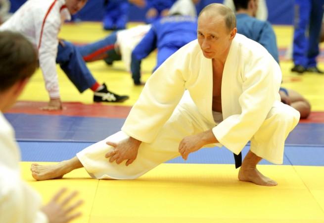 Russia's Prime Minister Vladimir Putin takes part in a judo training session at the 'Moscow' sports complex in St. Petersburg, on December 22, 2010 vladimir putin