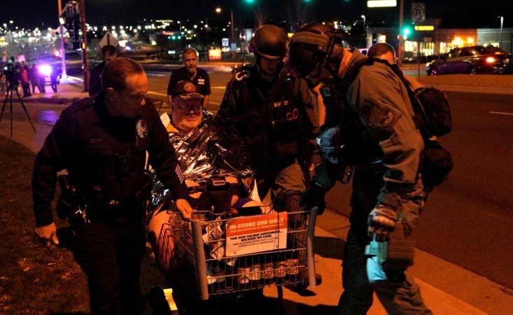 Patrick Carnes is evacuated in a Walmart cart by SWAT medics from the scene of a shooting at a Walmart where Carnes was shopping in Thornton, Colorado November 1, 2017. lorado shooting