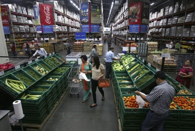 Customers shop at a Best Price Modern Wholesale store, a joint venture of Wal-Mart Stores Inc and Bharti Enterprises Supermarket