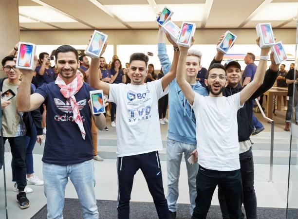 Customers with the new iPhone X in Sydney Customers with the new iPhone X in Sydney