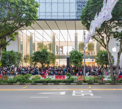 Customers waiting outside an Apple store in Singapore to buy iPhone X Customers waiting outside an Apple store in Singapore to buy iPhone X