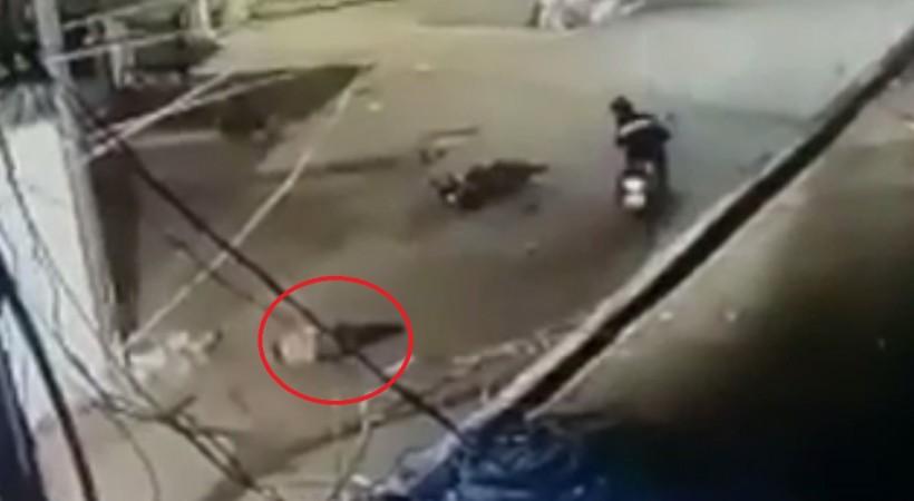 Cop lies on the road after a car hit him near Kapra in Telangana's Rangareddy district Cyberabad