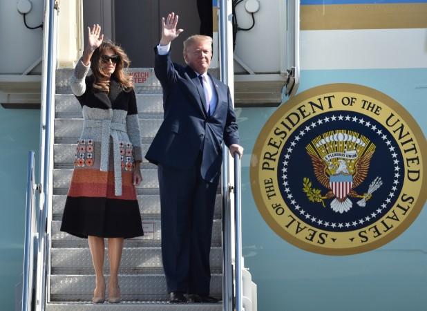 U.S. President Donald Trump (R) and his wife Melania (L) arrive at U.S. Air Force Yokota Air Base in Fussa, on the outskirts of Tokyo, Japan. Trump arrives in Japan