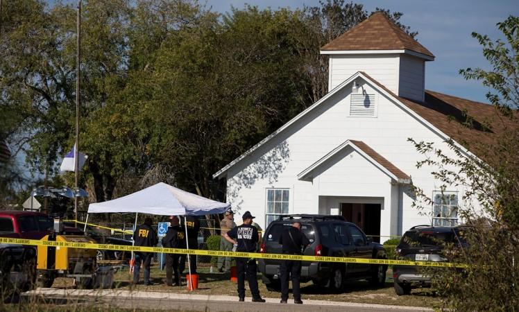 Law enforcement officials investigate a mass shooting at the First Baptist Church in Sutherland Springs, Texas Texas