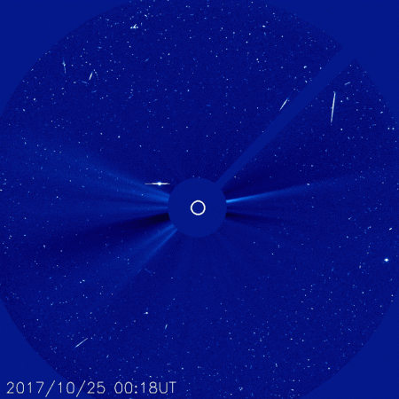 The comet entered the lower right corner of SOHO's view, and skirted up and around the right edge before leaving on Oct. 30. Jupiter can be seen passing left-to-right behind the solid central disk — called an occulting disk — that blocks sunlight and allows SOHO to see the solar atmosphere, planets and comets. nasa, comet, SOHO,