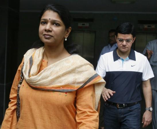 Kanimozhi (L), a lawmaker and daughter of M. Karunanidhi, former chief minister of the southern Indian state of Tamil Nadu and chief of the Dravida Munnetra Kazhagam (DMK) party and Kalaignar TV managing director Sharad Kumar depart for court from their residence in New Delhi May 20, 2011. M. Karunanidhi