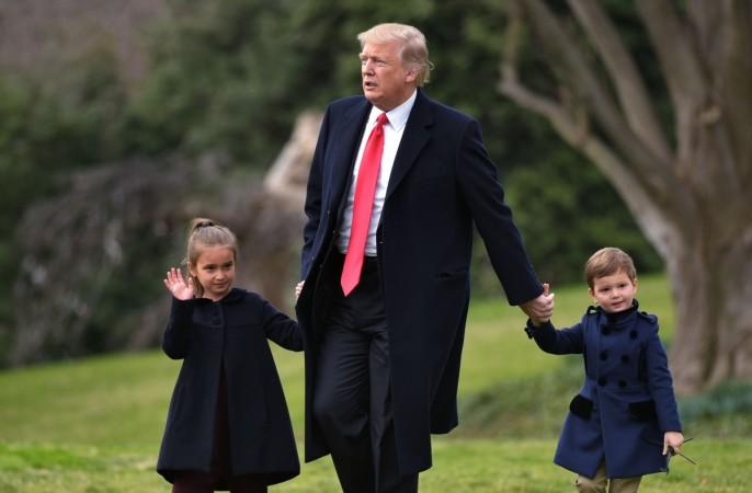 Donald Trump makes his way to board Marine One with grandchildren Arabella Kushner (L) and Joseph Kushner, from the White House in Washington, DC, on March 3, 2017. Arabella Kushner