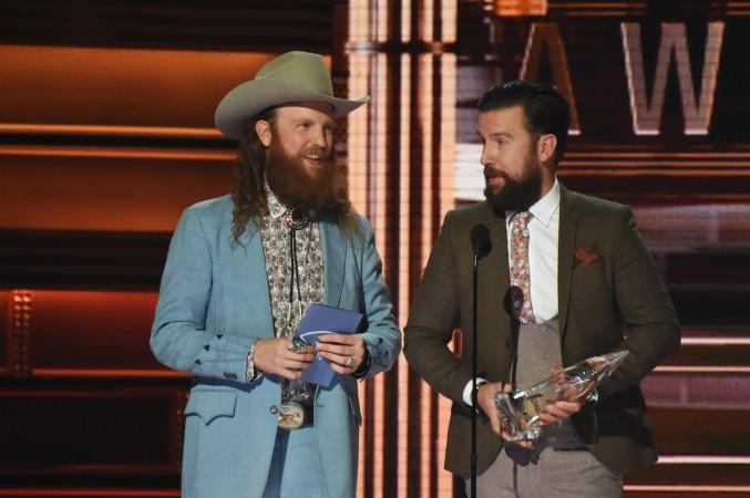 John Osborne and T.J. Osborne of Brothers Osborne accept an award onstage at the 51st annual CMA Awards at the Bridgestone Arena on November 8, 2017 in Nashville, Tennessee. cma 2