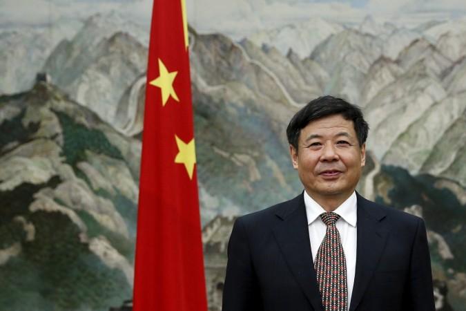 China's Vice Finance Minister Zhu Guangyao poses for a photograph before an interview with Reuters at the Chinese embassy in London, Britain July 18, 2015. Zhu Guangyao