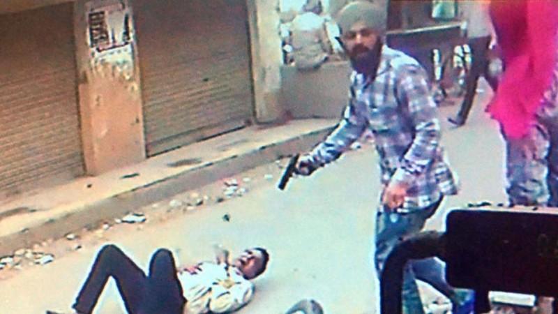 In picture: Haraj Sandhi seen in this CCTV footage screengrab shooting at Hindu Sangharsh Sena leader Vipan Sharma. Killing