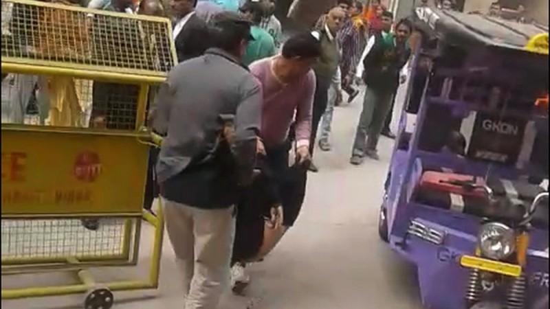 A screen grab shows body of undertrial prisoner Vinod alias Balle being taken away from Rohini court complex, in New Delhi, on November 13. According to the police Vinod was fired upon by around 11:20 am near the canteen area of the court complex. undertrial prisoner Vinod