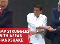 Donald Trump struggles with ASEAN group handshake