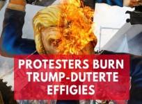 Protesters burn effigies of Donald Trump and Philippines president Rodrigo Duterte
