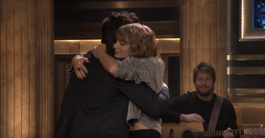 Taylor Swift hugging The Tonight Show host, Jimmy Fallon. taylor