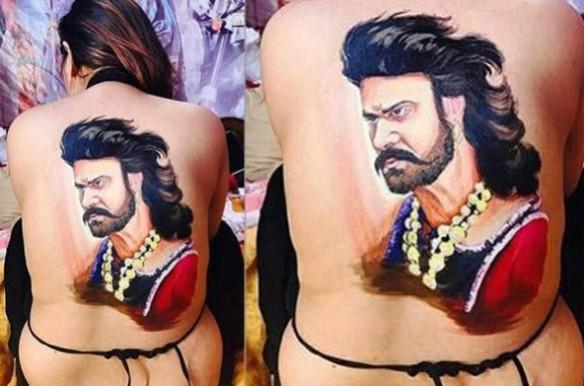 Female fan painted her bare back with a picture of Prabhas Crazy female fan of Prabhas