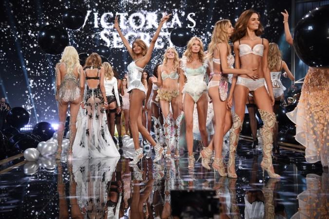 ictoria's Secret model Jourdan Dunn (C) walks the runway during the 2014 Victoria's Secret Fashion Show at Earl's Court exhibition centre on December 2, 2014 in London, England. jourdan