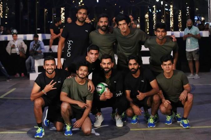 Nikk Freestyler (on Virat Kohli's right) freestyle football