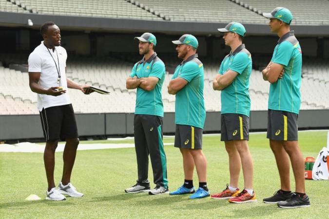 Usain Bolt offering tips to Australian players. Usain Bolt, Glenn Maxwell, Ashton Agar, Peter Handscomb, Aaron Finch