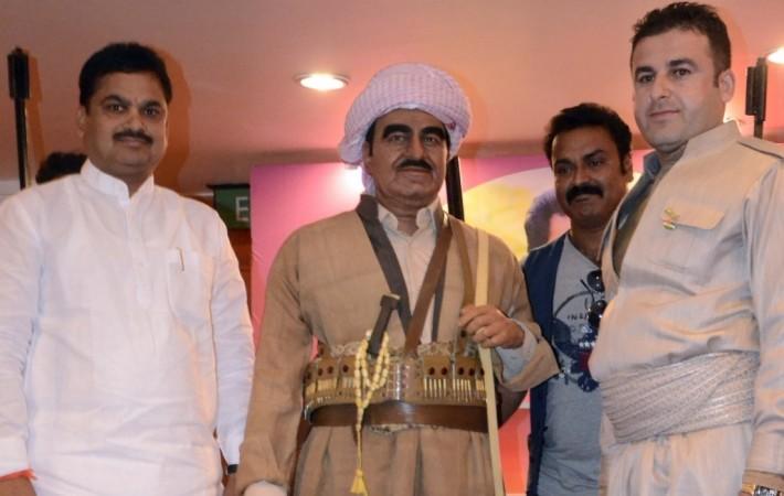 (L) Maharashtra Water Conservation Minister Ram Shinde with (R) Sculptor and managing director of the Lonavala-based Wax Museum Sunil Kandalloor unveiling a wax model of Former Kurdish nationalist leader Mustafa Barzani in 2016. Ram Shinde