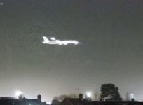 Mystery object flashes over Heathrow Airport sky moments before passenger jet makes landing
