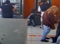 Four-year-old swipes cash straight from under ATM users nose