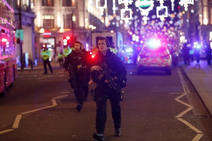 Armed police officers walk along Oxford Street, in London, Britain November 24, 2017 Oxford Street