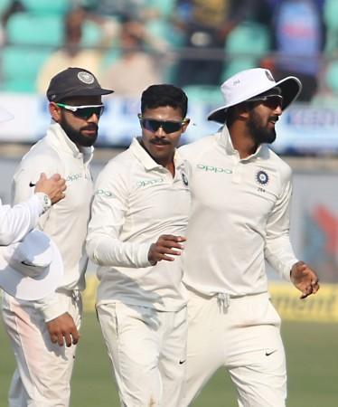 From left: Kohli, Jadeja and KL Rahul celebrate Dickwella's dismissal in Nagpur on Friday (November 24) during the second Test. Virat Kohli
