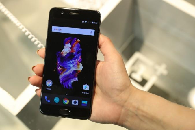 BERLIN, GERMANY - JUNE 21: A visitor holds the new OnePlus 5 smartphone at a OnePlus pop-up store at the Bikini Berlin shopping mall on June 21, 2017 in Berlin, Germany. Chinese smartphone maker OnePlus is launching the OnePlus 5 today in Europe at pop-up stores in Berlin, Amsterdam and London. OnePlus Launches OnePlus 5 Smartphone At Berlin Flash Store