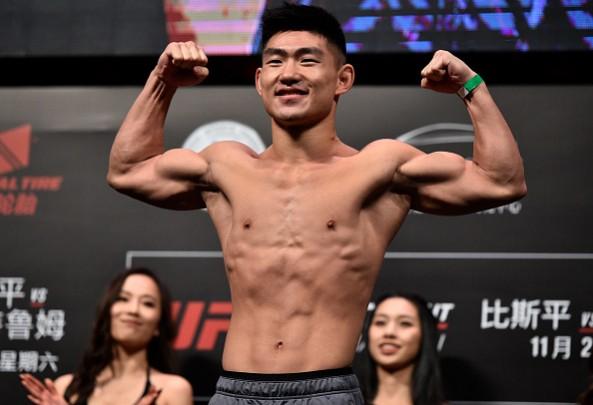 Song Yadong of China poses on the scale during the UFC Fight Night weigh-in on November 24, 2017 in Shanghai, China ufc