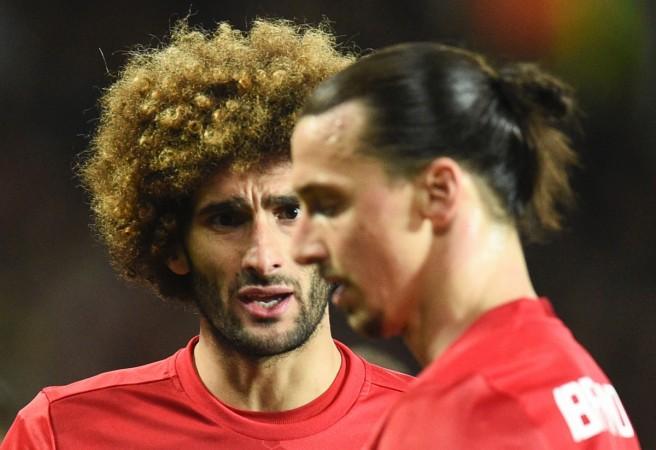 Manchester United stars Marouane Fellaini (L) and Zlatan Ibrahimovic manchester united