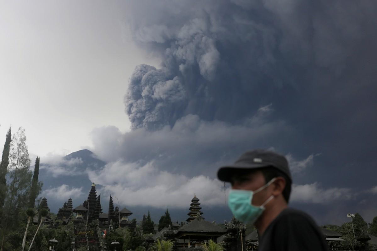 Mount Agung volcano erupts as seen from Besakih Temple in Karangasem, Bali, Indonesia Bali volcano