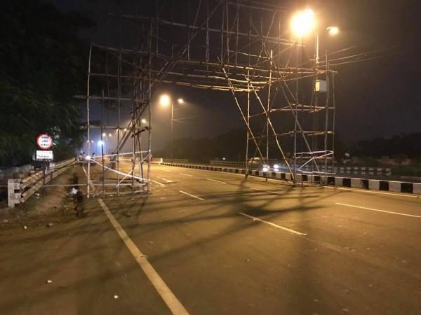 The wooden structure which is erected on the Avinashi Road ahead of MGR 100th centenary. The techie reportedly fell from his bike after he collided with the structure. structure