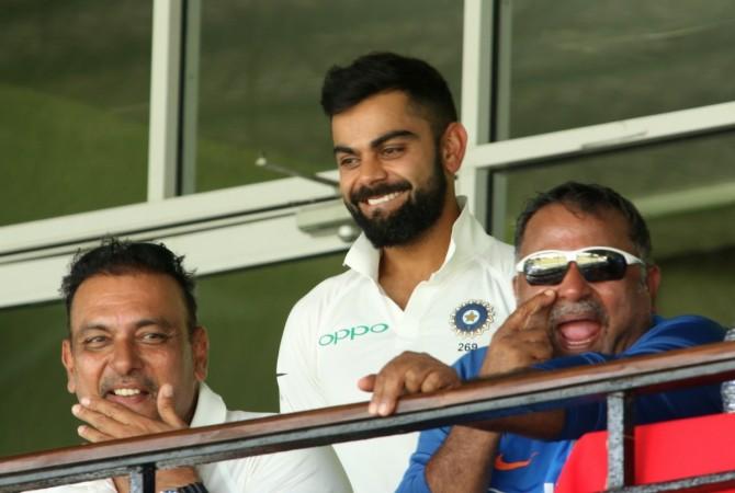 File photo of Ravi Shastri (L), Virat Kohli and Bharat Arun (R) Virat Kohli and Ravi Shastri