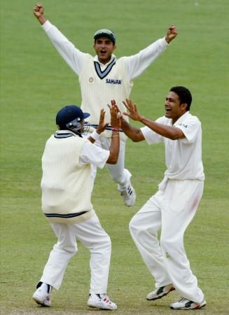 India's (L-R) Akash Chopra, captain Sourav Ganguly and Anil Kumble celebrate taking the wicket of Australia's Ricky Ponting on the final day of the fourth Test at the Sydney Cricket Ground January 6, 2004. The match was drawn, with India retaining the Border-Gavaskar trophy after the series ended 1-1. Anil Kumble Sourav Ganguly Aakash Chopra