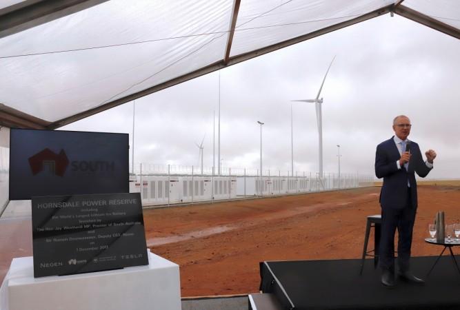 South Australian Premier, Jay Weatherill speaks as he stands next to a plaque during the official launch of the Hornsdale Power Reserve, featuring the world's largest lithium ion battery made by Tesla, near the South Australian town of Jamestown, in Australia, December 1, 2017. Tesla world's largest li-ion battery