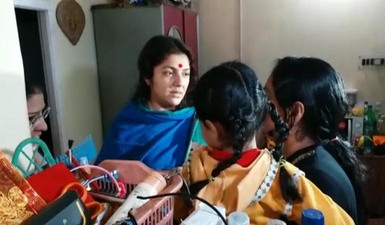 In picture: VJP leader Locket Chatterjee (centre) visits the house of the victim on Saturday, December 2, 2017. Locket Chatterjee