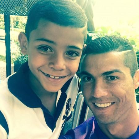 Dribbles and SCORES! Cristianinho emulates his dad Cristiano Ronaldo ...