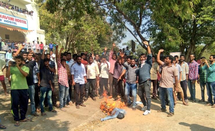 In picture: Students at the Osmania University burn an effigy in protest after one of them committed suicide on Sunday. Osmania University protest