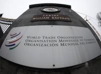 File photo of the World Trade Organization logo seen at the entrance of the headquarters in Geneva April 9, 2013.