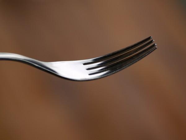 The inmate tried to kill the warden with a fork. fork