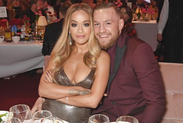 Rita Ora (L) and Conor McGregor attend a drinks reception ahead of The Fashion Awards 2017 in partnership with Swarovski at Royal Albert Hall on December 4, 2017 in London, England conor mcgregor, ufc, rita ora