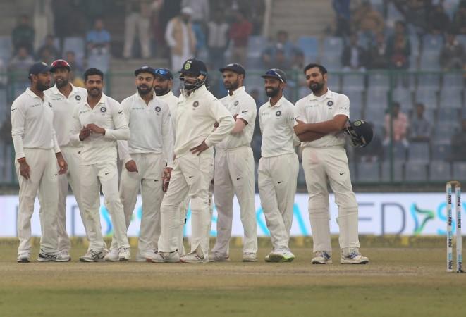 Indian players wait for a decision from the third umpire during the third Test against Sri Lanka in Delhi on Tuesday (December 5). Team India