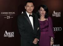 Hong Kong actor Chow Yun-fat and wife Jasmine arrive for the Asian Film Awards in Hong Kong March 21, 2011