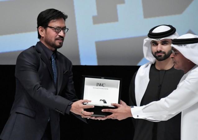 Irrfan Khan on stage after he received his Honorary Award from HH Sheikh Mansoor bin Mohammed bin Rashid Al Maktoum and DIFF Chairman Abdulhamid Juma during the Opening Night Gala of the 14th annual Dubai International Film Festival held at the Madinat Jumeriah Complex on December 6, 2017, in Dubai, United Arab Emirates. Irrfan Khan