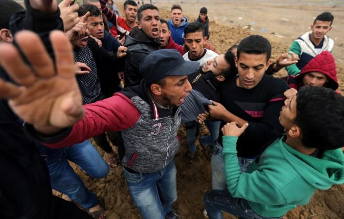 In picture: A wounded Palestinian protester is evacuated during clashes with Israeli troops at a protest against US President Donald Trump's decision to recognise Jerusalem as the capital of Israel, near the border with Israel in the southern Gaza Strip December 7, 2017. Jerusalem