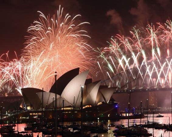 New Year fireworks illuminate the sky over the iconic Opera House and Harbour Bridge in Sydney on January 1, 2017. Sydney Fireworks new year
